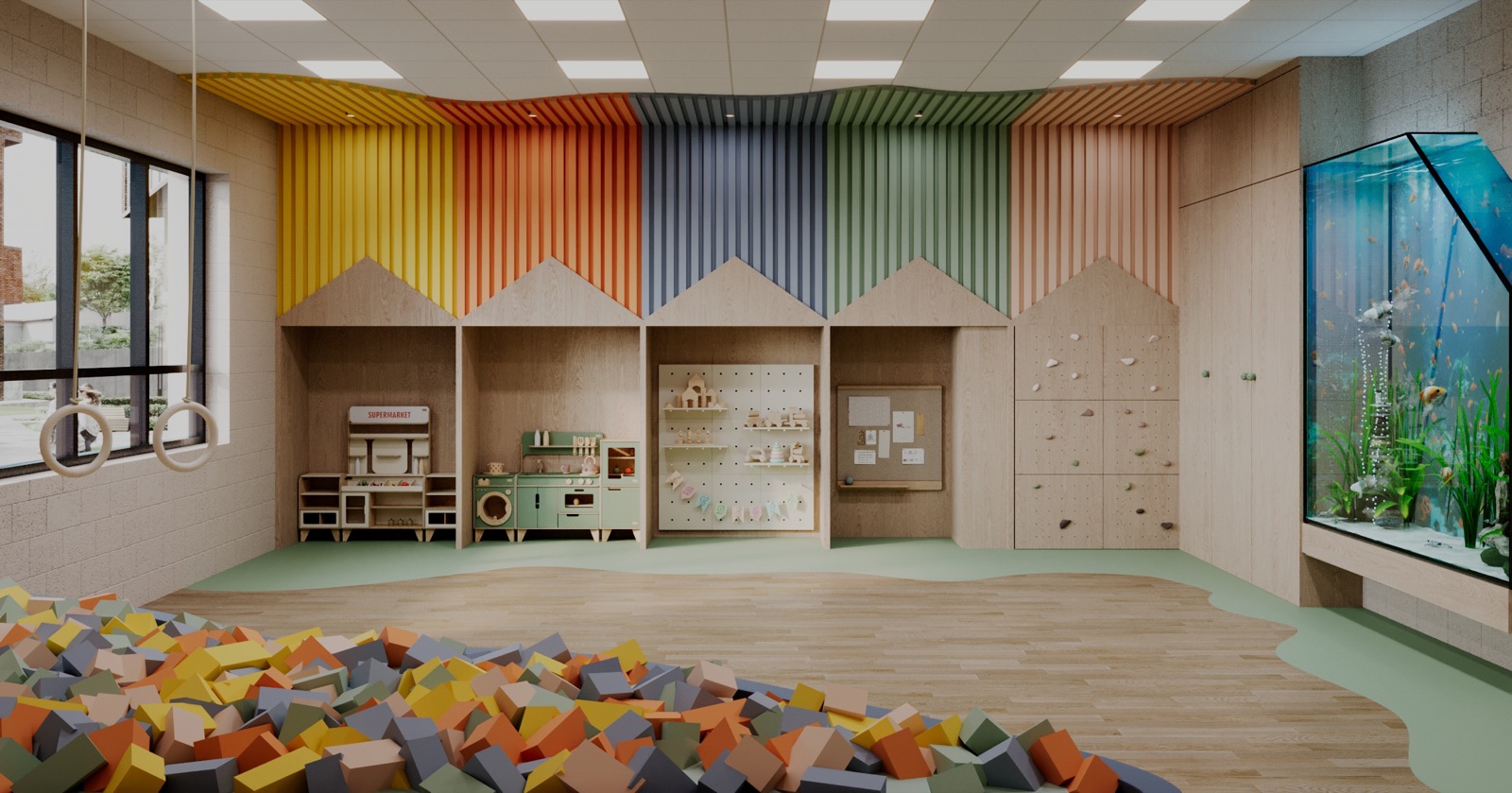 The playroom with a foam pit and climbing wall